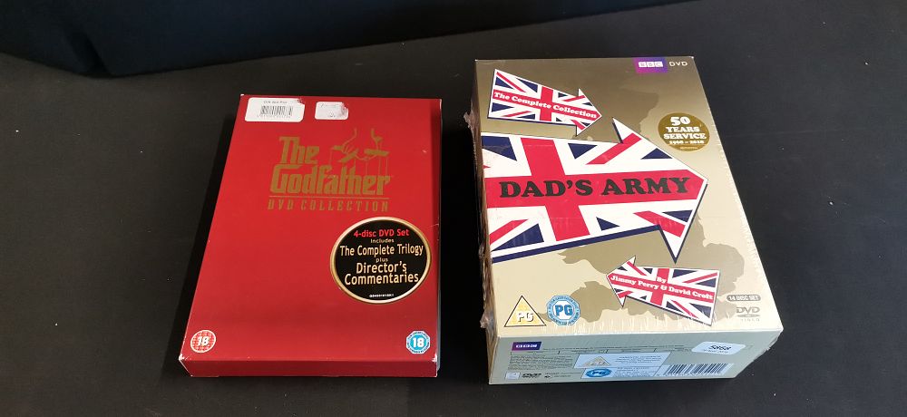 Lot 394: Two DVD Box Sets comprising The Godfather Trilogy and Dads Army The Complete Collection