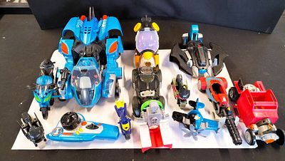 A Collection of Imaginext DC Super Friends and VTech Character Action Toy Vehicles. An 