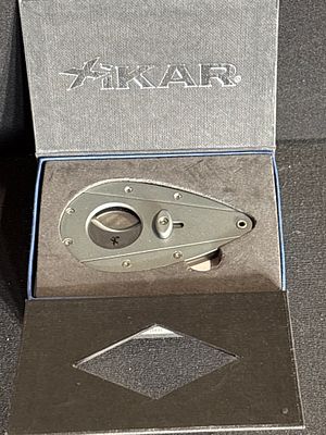 Xikar Xi100 Titanium Series Cigar Cutter. A Xikar Xi100 series double-guillotine cigar cutter 