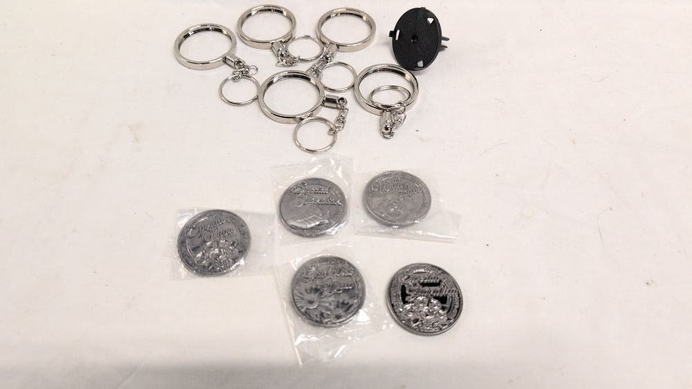 Lot 741: A Collection of Cherished Coin Commemorative Tokens and Mounting Accessories