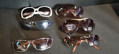 An Assortment of Six Pairs of Fashion Sunglasses. An assortment of six pairs of contemporary 