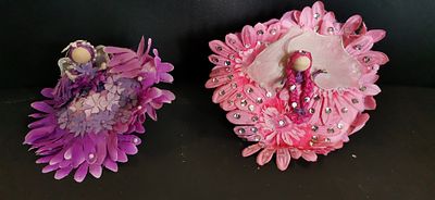 A Pair of Contemporary Mixed-Media Flower Fairy Figurines. A pair of stylized decorative 
