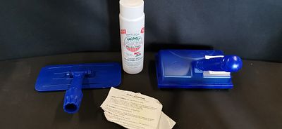 An Assortment of Carpet and Upholstery Cleaning Supplies Including Kleeneze and Nowet. An 