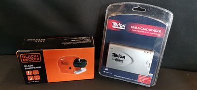 Two consumer electronics comprising a Black & Decker BXSHAA860 blade sharpener and a Tevion USB 