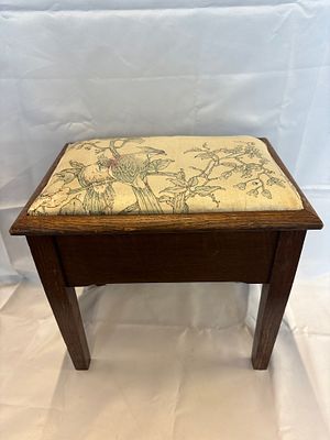 An Arts and Crafts Style Quarter-Sawn Oak Footstool with Bird's Nest Pattern Upholstery. A 