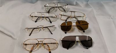 A Collection of Seven Pairs of Vintage Metal Eyewear Including Jaeger Titanium Spectacles. A 