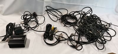 An Assortment of Audio Equipment including a Neewer NW-48V Phantom Power Supply and Cables. This 