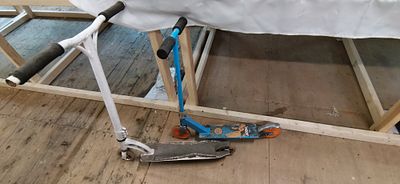 Two metal kick scooters including a Zoom folding model. COLLECTION ONLY. This lot comprises two 