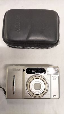 Nikon Nuvis 300 APS Compact Film Camera and Case. A Nikon Nuvis 300 compact film camera designed 