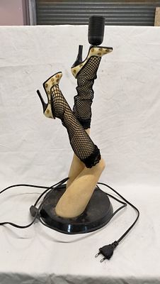 A Novelty Kitsch Twin-Leg Table Lamp. A novelty kitsch table lamp, modelled as a pair of female 