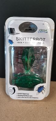 A Desk Pets Skitterbot Remote-Controlled Toy in Original Packaging. A Desk Pets Skitterbot 