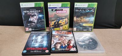 A Collection of Six Video Games and DVD Movies Including Factory Sealed Xbox 360 Titles. A 