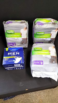 An Assortment of Depend and TENA Men's Incontinence Products. This lot comprises an assortment 
