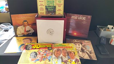 A Collection of Approx 42 Vintage Vinyl Records Including LPs and a Promotional Single with 