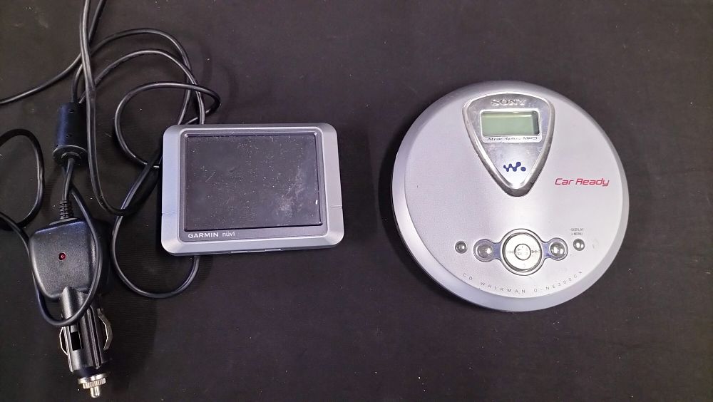 Lot 479: Two Portable Electronic Devices comprising a Sony CD Walkman and a Garmin nuvi GPS
