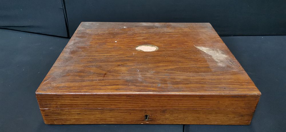 Lot 560: An Early 20th Century Oak Fitted Canteen Case
