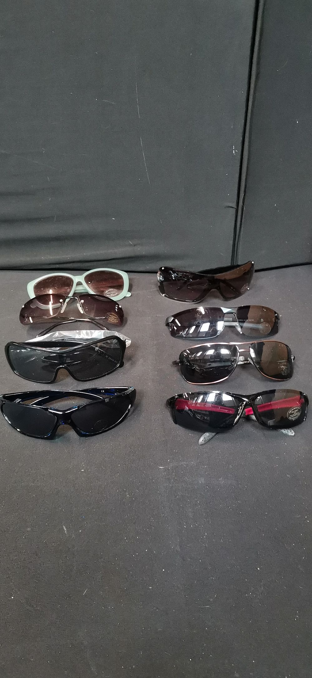 Lot 573: A Lot of Eight Pairs of Mixed Contemporary Sunglasses