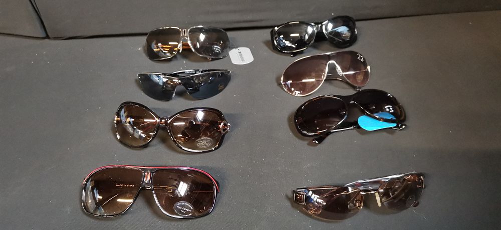Lot 586: An Assortment of Eight Pairs of Sunglasses including Carrera Style Pilot Frames