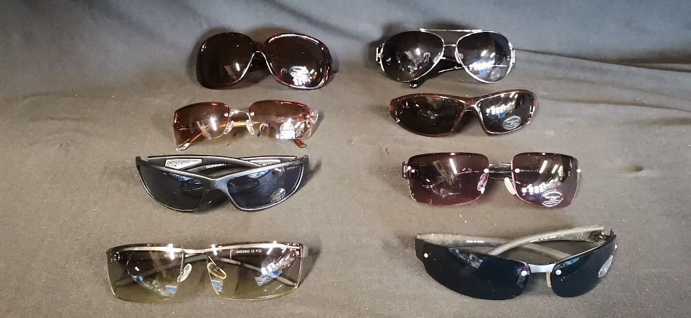 Lot 594: A Collection of Eight Pairs of Assorted Contemporary Sunglasses including Donnay and Aviator Styles