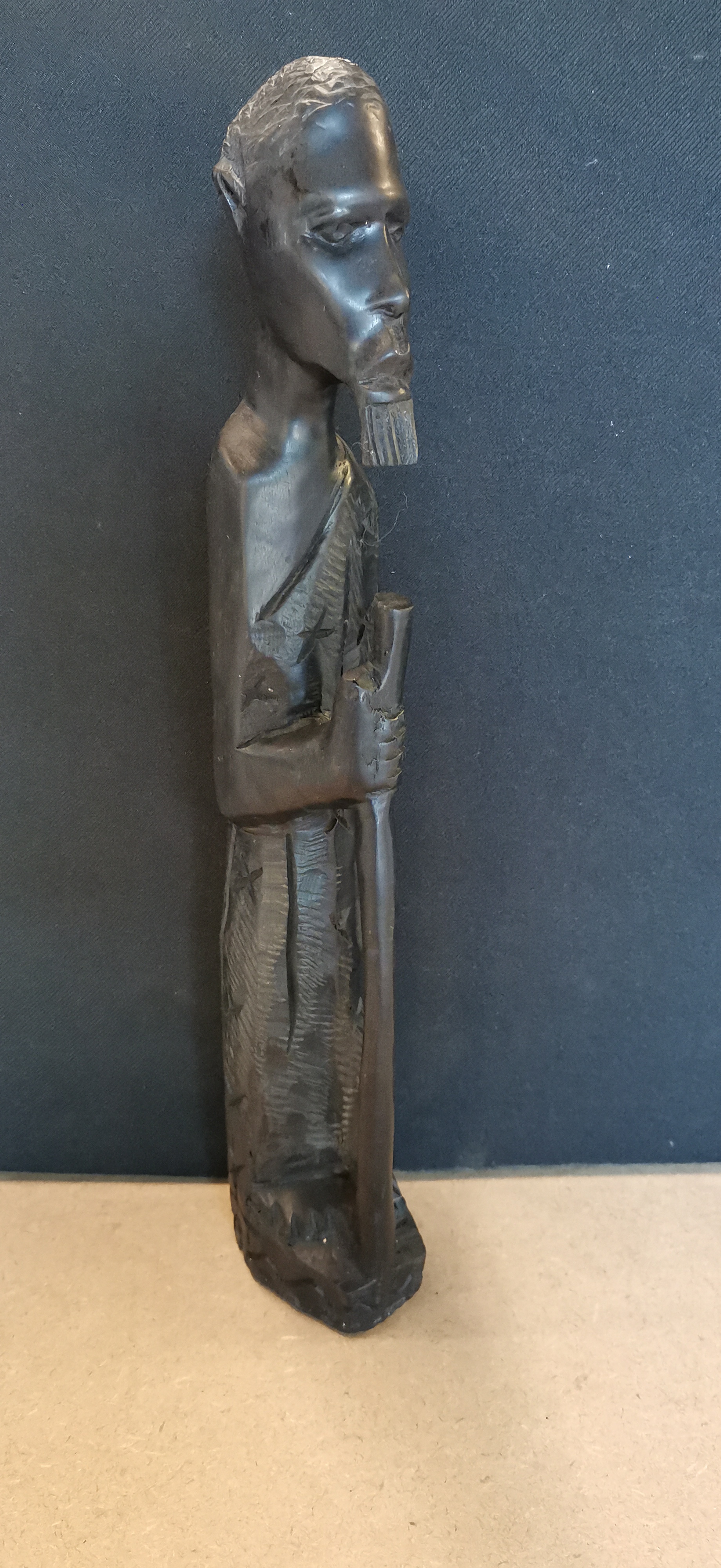 East African Carved Hardwood Figure of a Man with a Staff
