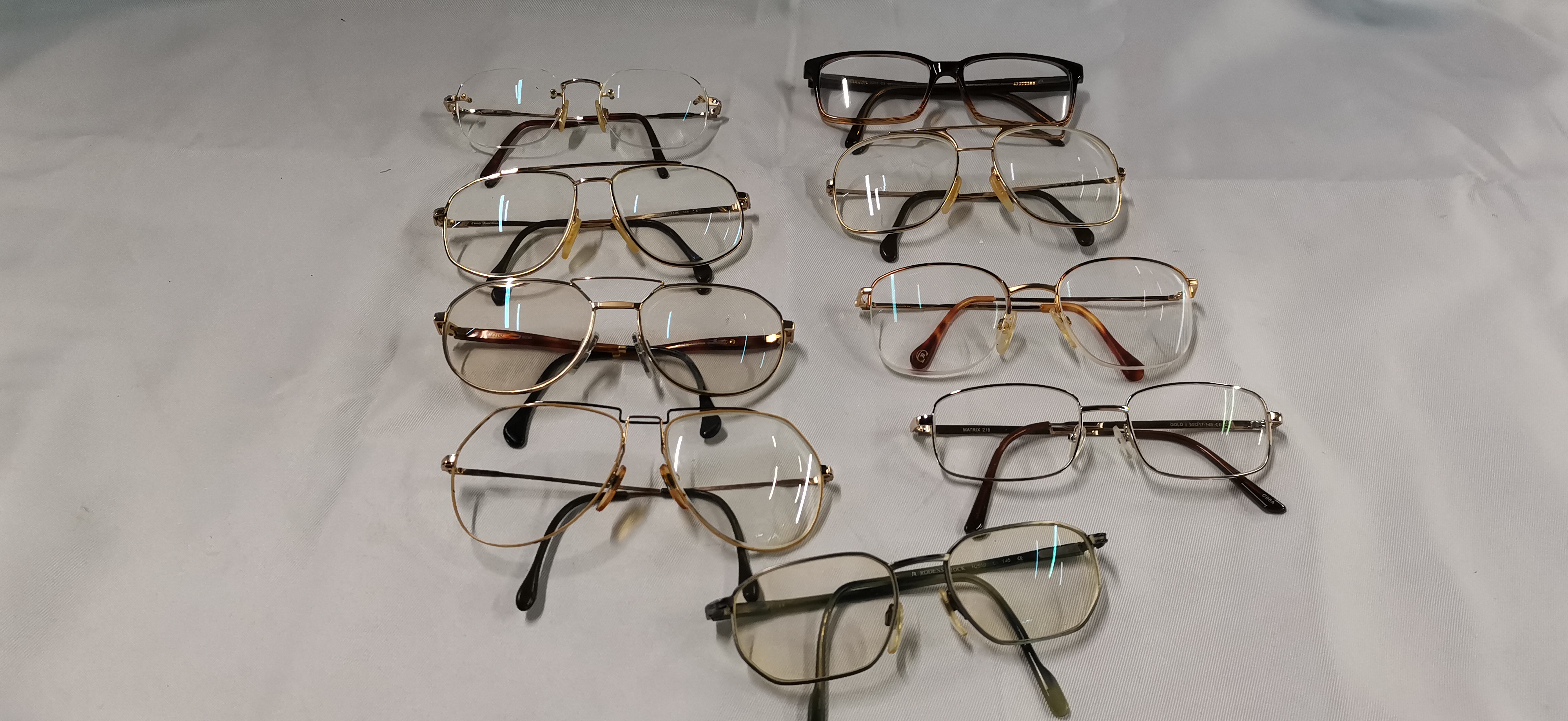Nine pairs of vintage and contemporary eyewear including Rodenstock and Matrix frames