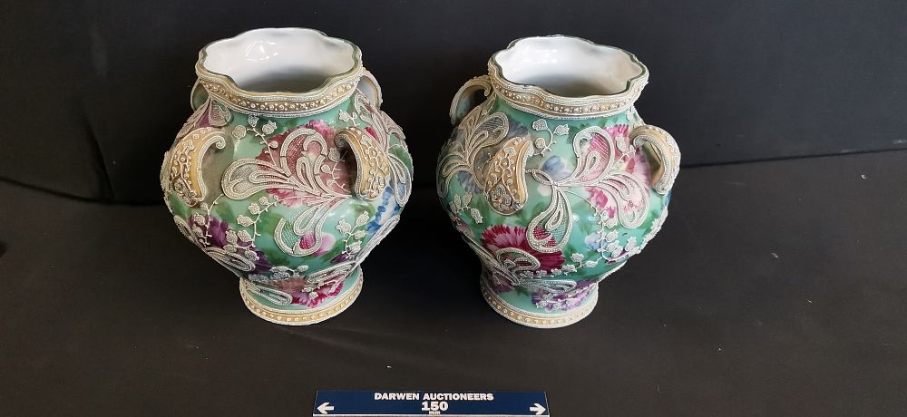 A pair of German porcelain vases produced by Oscar Schlegelmilch of Langewiesen,