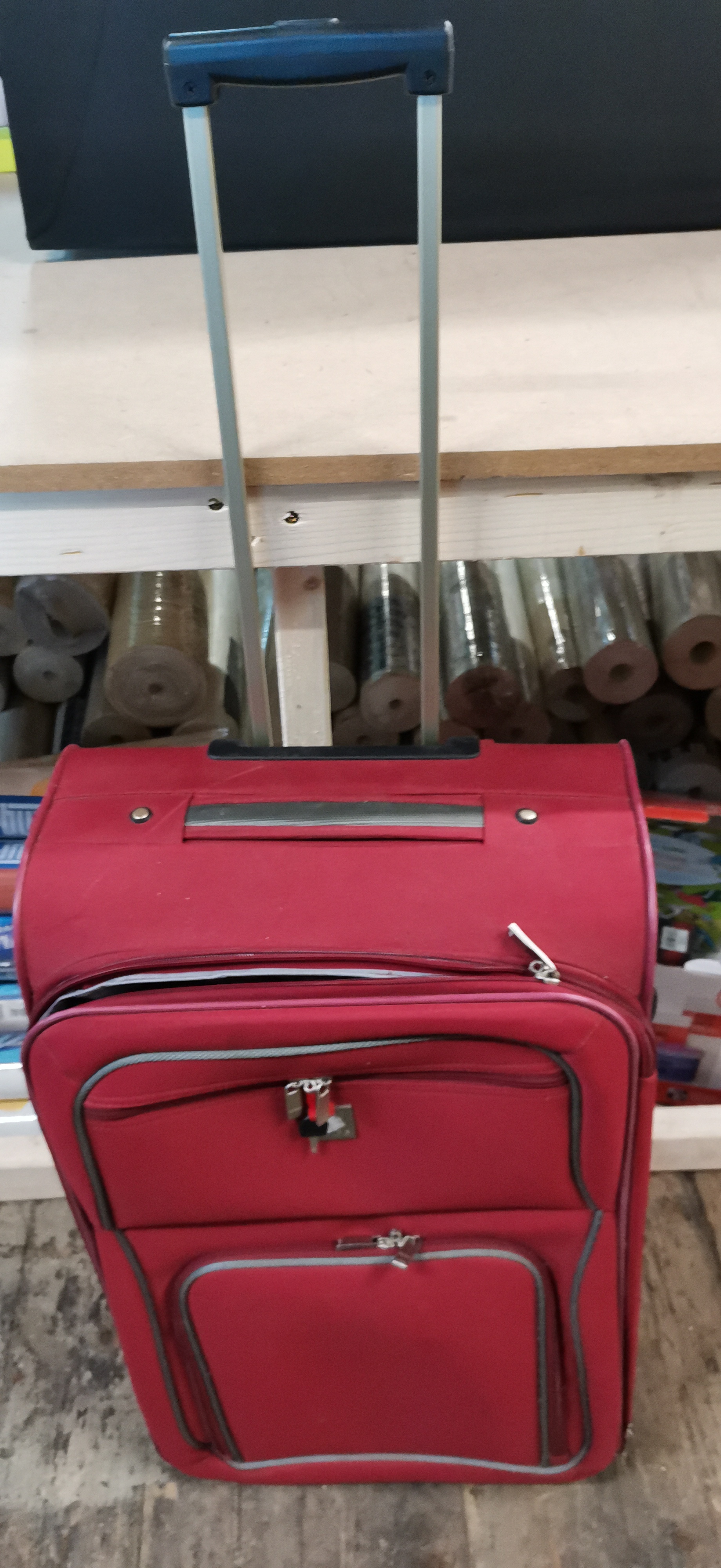 A Tripp Red Softshell Upright Wheeled Suitcase. COLLECTION ONLY