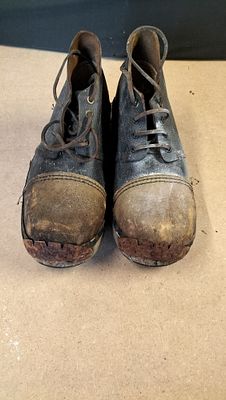 A Pair of Vintage Leather and Wood Lace-up Work Clogs. A pair of black leather and tan wood 