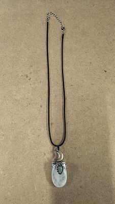 Quartz and Labradorite Crescent Moon Pendant Necklace. A quartz and labradorite crescent moon 