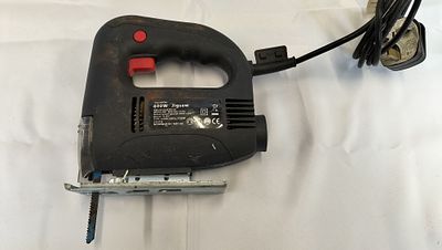 Woolworths 400W Corded Jigsaw Model MIQ-DD2-55BD, Tested for Power. A black Woolworths 400W 