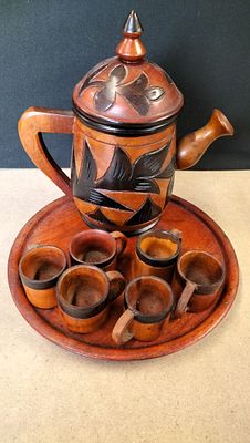 A Collection of Hand-Carved Wooden Tea Items. A collection of hand-carved wooden items 