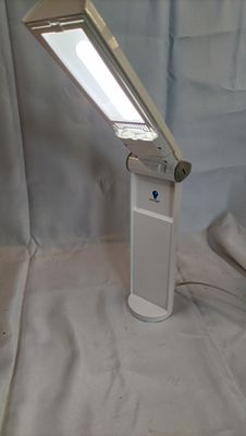 Daylight Twist Portable Lamp Model D/E33700 with Original Packaging. A white Daylight Twist 