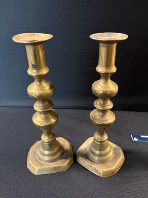 A Pair of Brass Beehive and Baluster Candlesticks in the Baroque Style. This pair of brass 