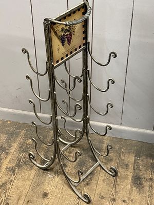 de Ladoucette, Metal Bottle Rack, Contemporary, Pouilly-Fum&eacute; Theme. A decorative freestanding 
