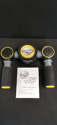 Hasbro TORX Handheld Electronic Game. A Hasbro TORX electronic handheld game unit, often 