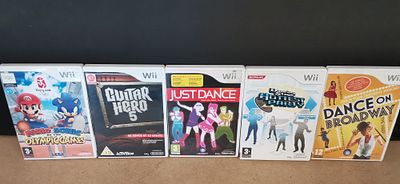 A Collection of Five Nintendo Wii Video Games including Mario & Sonic at the Olympic Games and 
