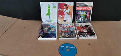 Seven Nintendo Wii Video Games including Wii Fit and Just Dance 2