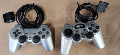 Two PlayStation 2 Compatible Analog Controllers Including Sony DualShock 2 SCPH-10010