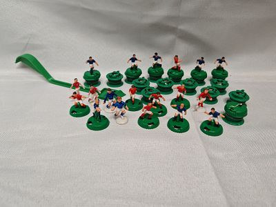A Collection of Vintage Pro Action Football Figures and Mechanical Bases