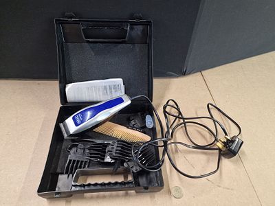A Wahl Home Pro Basic Corded Hair Clipper Set. Tested For Power