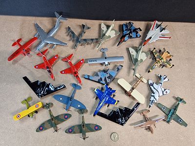 A Collection of 22 Miniature Die-cast and Plastic Model Aircraft