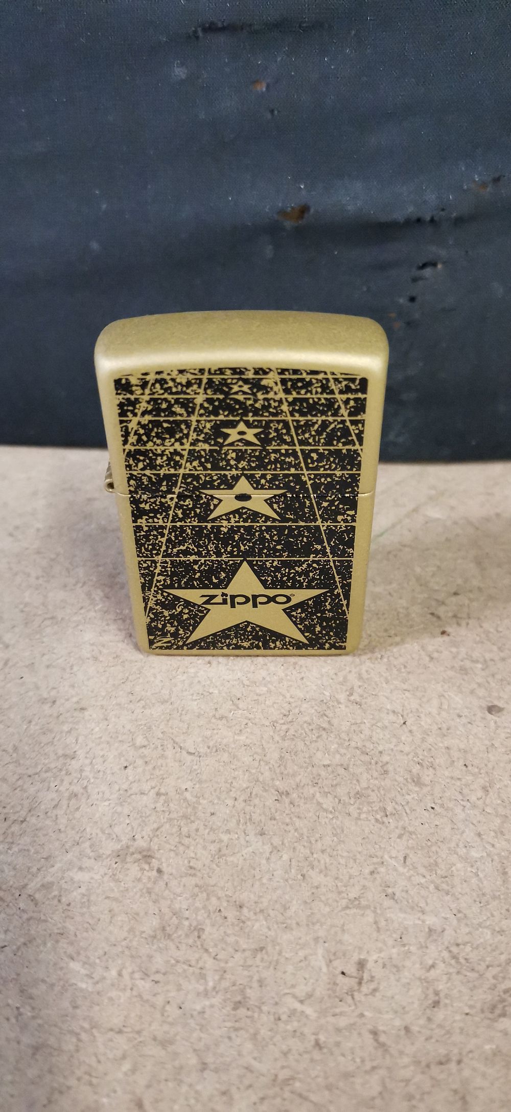 Lot 203: Zippo Matte Gold-Toned Windproof Lighter with Hollywood Walk of Fame Star Motif, 2017