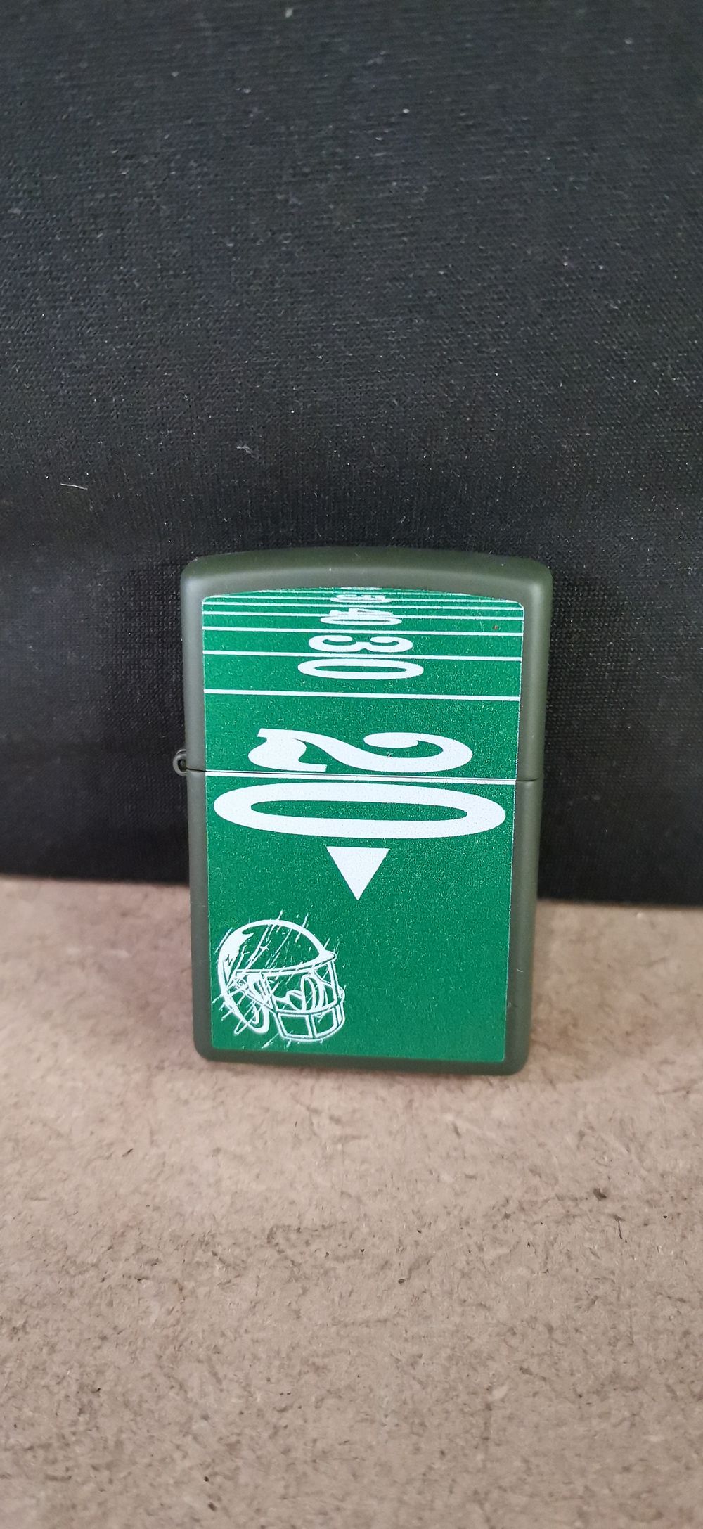 Lot 226: Zippo American Football Theme Matte Green Windproof Pocket Lighter 2018