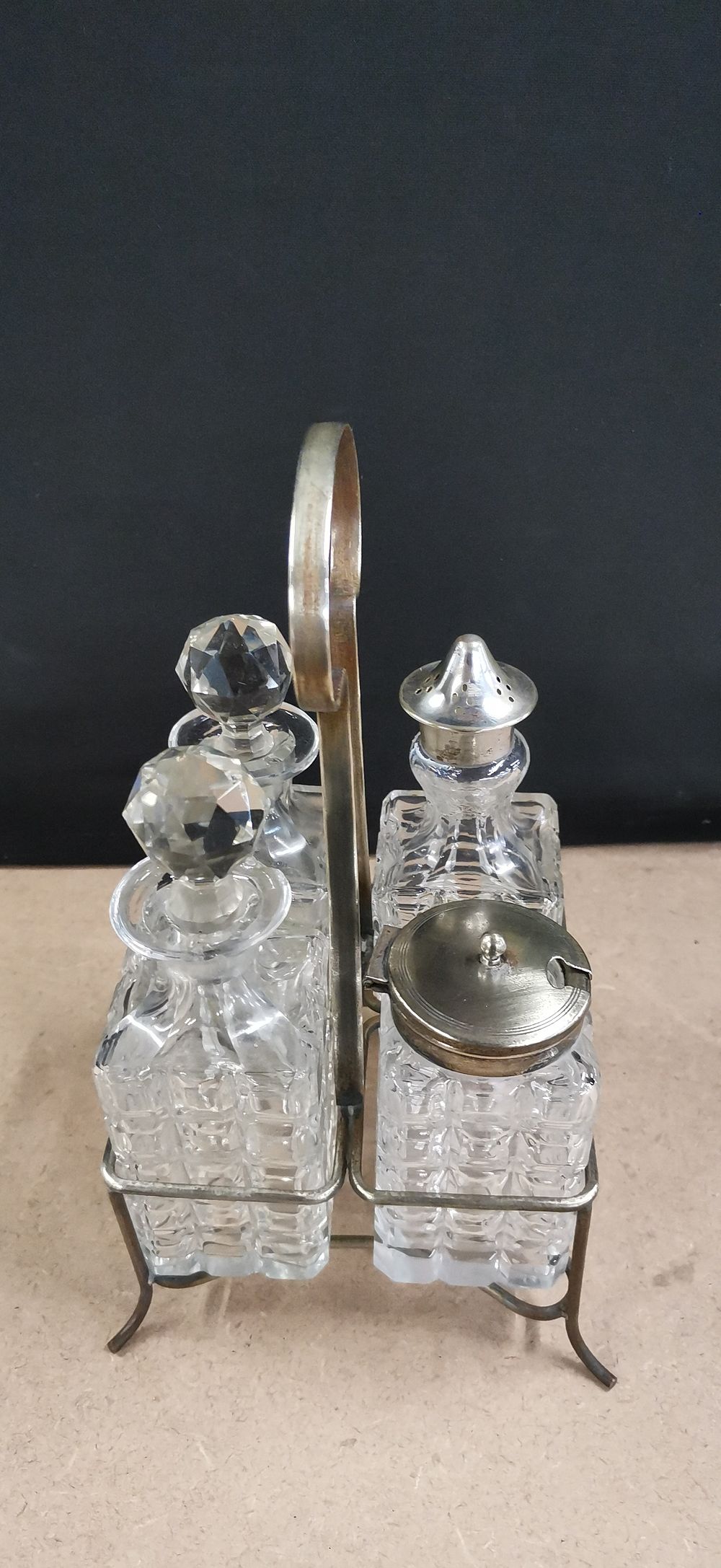 Lot 270: A Silver Plated Cut Glass Cruet Set