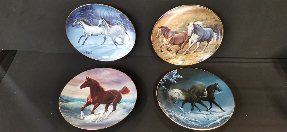Lot 277: A set of four limited edition equestrian themed porcelain collector plates by Franklin Mint and The Hamilton Collection