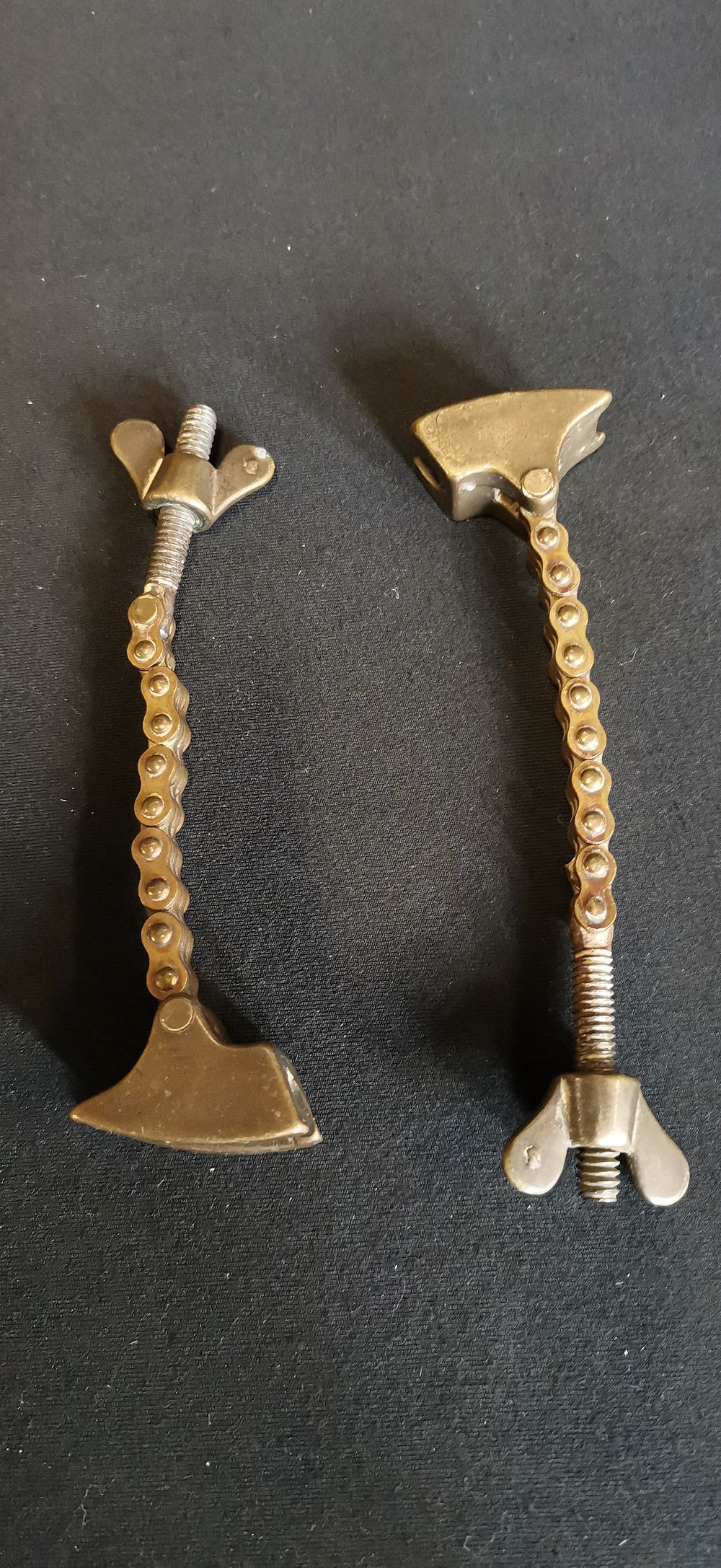 Lot 290: A Pair of Vintage Brass and Steel Tyre Bead Clamps