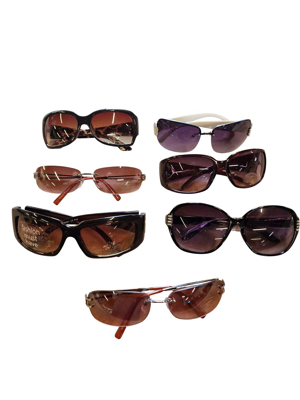 Lot 474: A Collection of Seven Pairs of Assorted Fashion Sunglasses