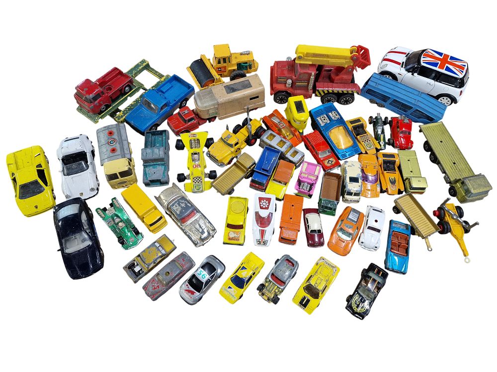 A Large Collection of Die-Cast Toy Vehicles including Matchbox and Corgi Style Models