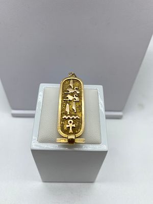 An 18ct yellow gold Egyptian pendant, 48mm x 16mm in size, 4.6 grams approx weight