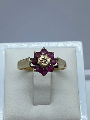 A 9ct yellow gold ruby & diamond dress ring, 2.2 grams in weight approx, size R,
